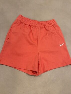 Nike Coral-orange Casual Athletic Shorts with White Swoosh